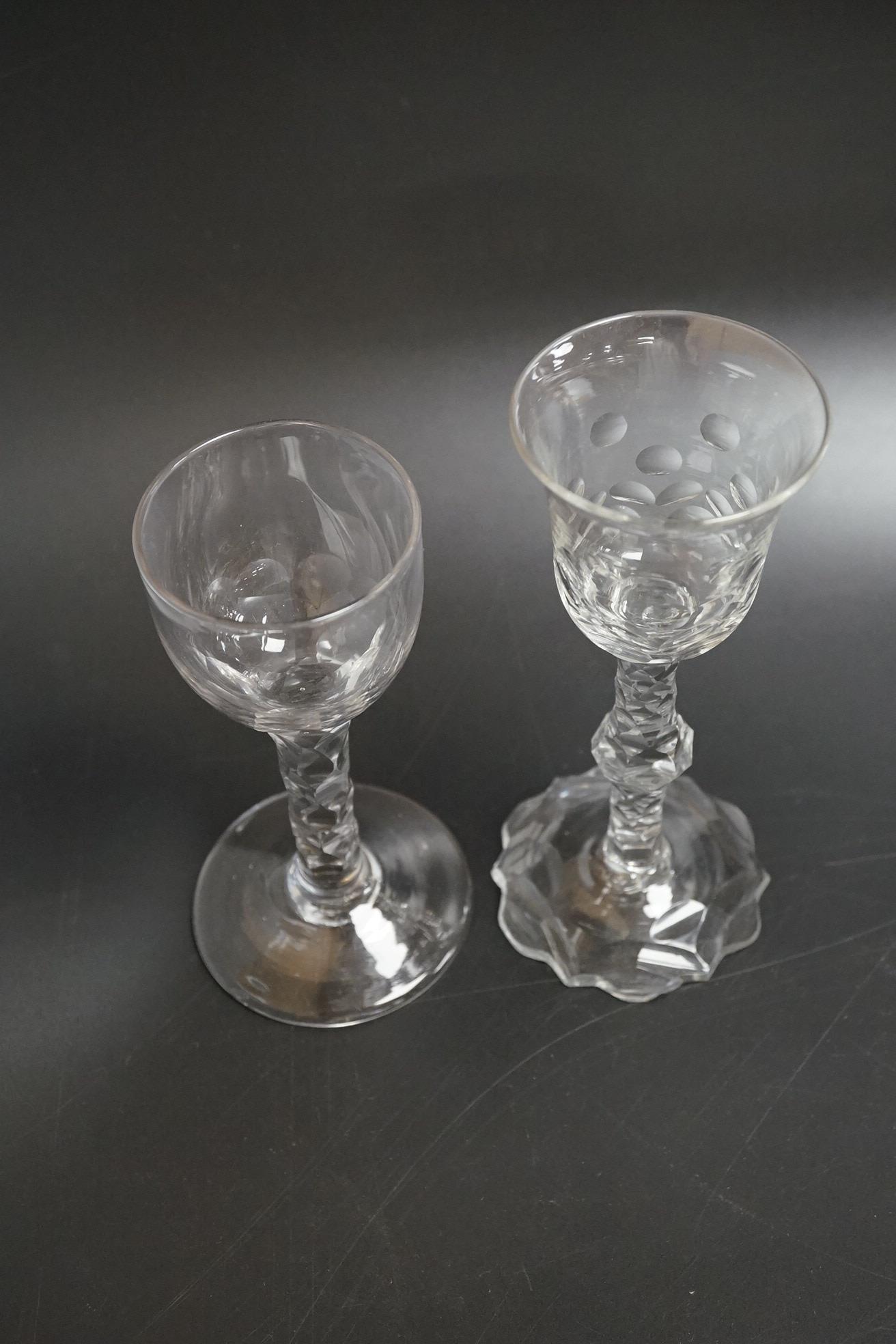 Two faceted wine glasses, c.1775, one with faceted star cut foot, tallest 15cm